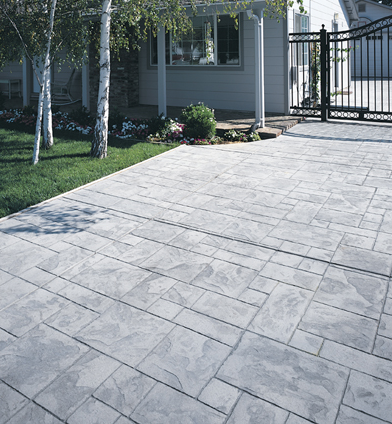Gray stone stamped front patio in Evanston.