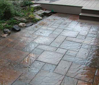 Paver style stamped concrete patio.