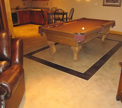 Decorative interior concrete floor in a basement of a house in Illinois.