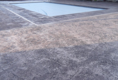 Gray textured indoor pool deck.