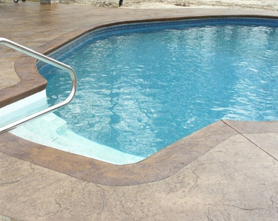 Textured and stained pool deck in Evanston.
